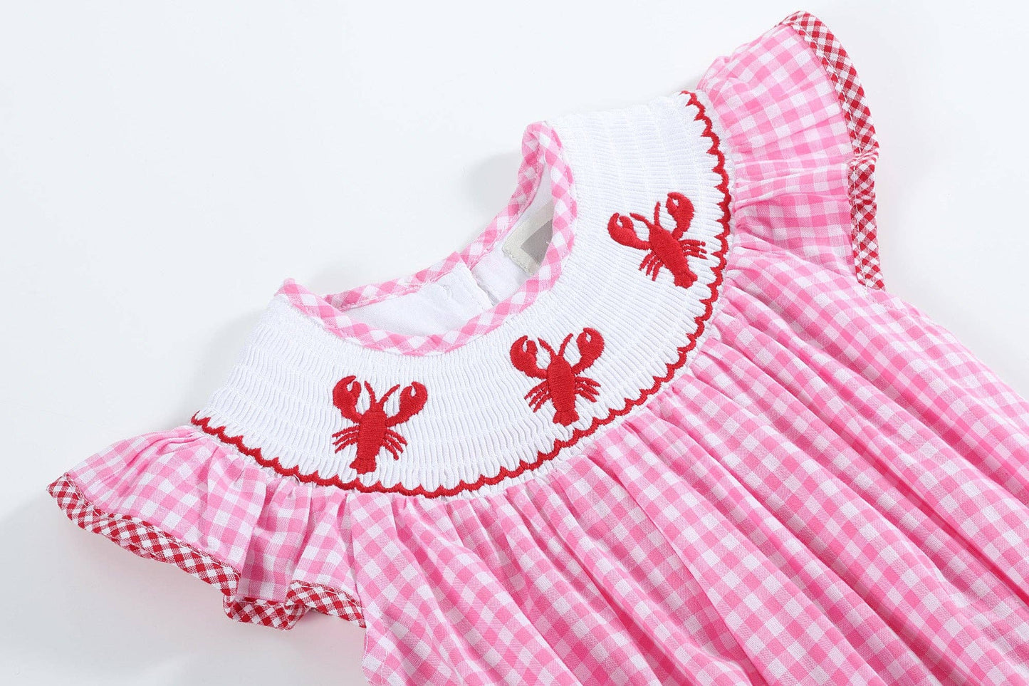 Sweet & Sassy Crawfish Smocked Romper