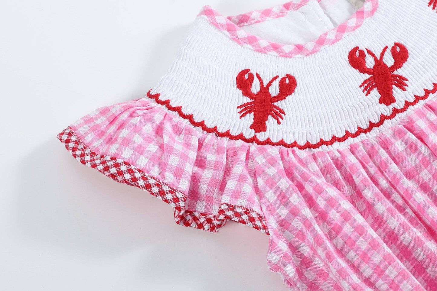 Sweet & Sassy Crawfish Smocked Romper